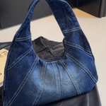 Woman carrying a casual shoulder bag