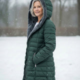 Woman wearing a fleece-lined quilted padded jacket with a shaped waist