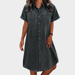 Woman wearing a lightweight denim button-through shirt dress