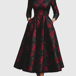 Woman wearing a floral print A-line maxi dress