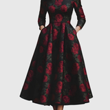 Woman wearing a floral print A-line maxi dress