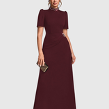 Woman wearing an elegant bridesmaid and evening gown