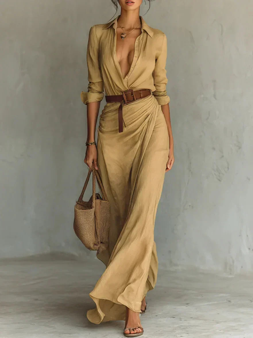 Woman wearing a wrap-style maxi dress with belt