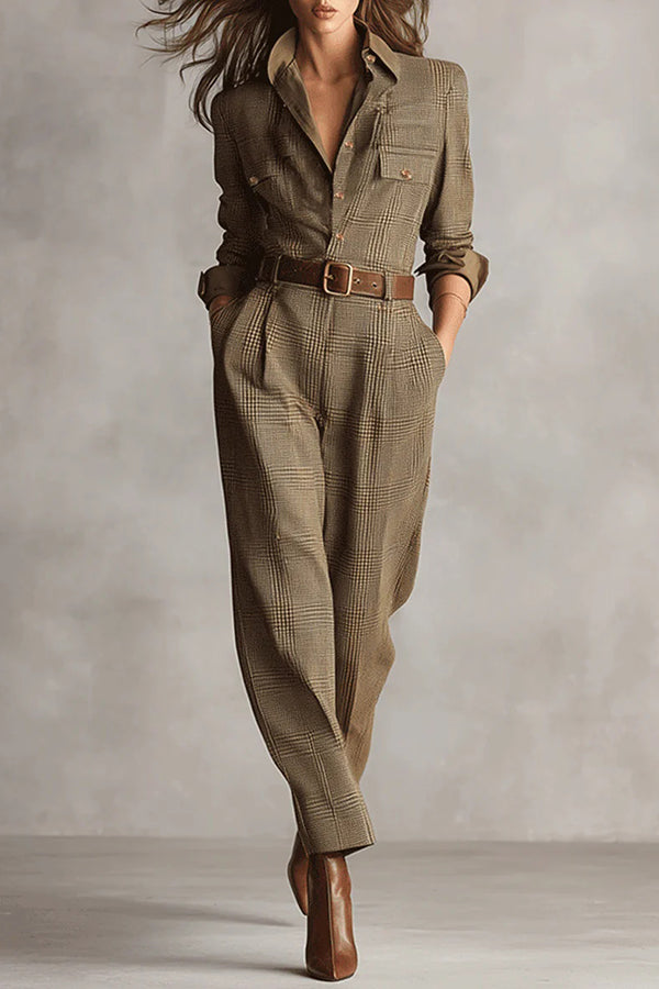 Woman wearing a tailored check jumpsuit with belt