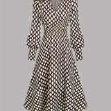 Woman wearing a rhombus print dress with belted waist