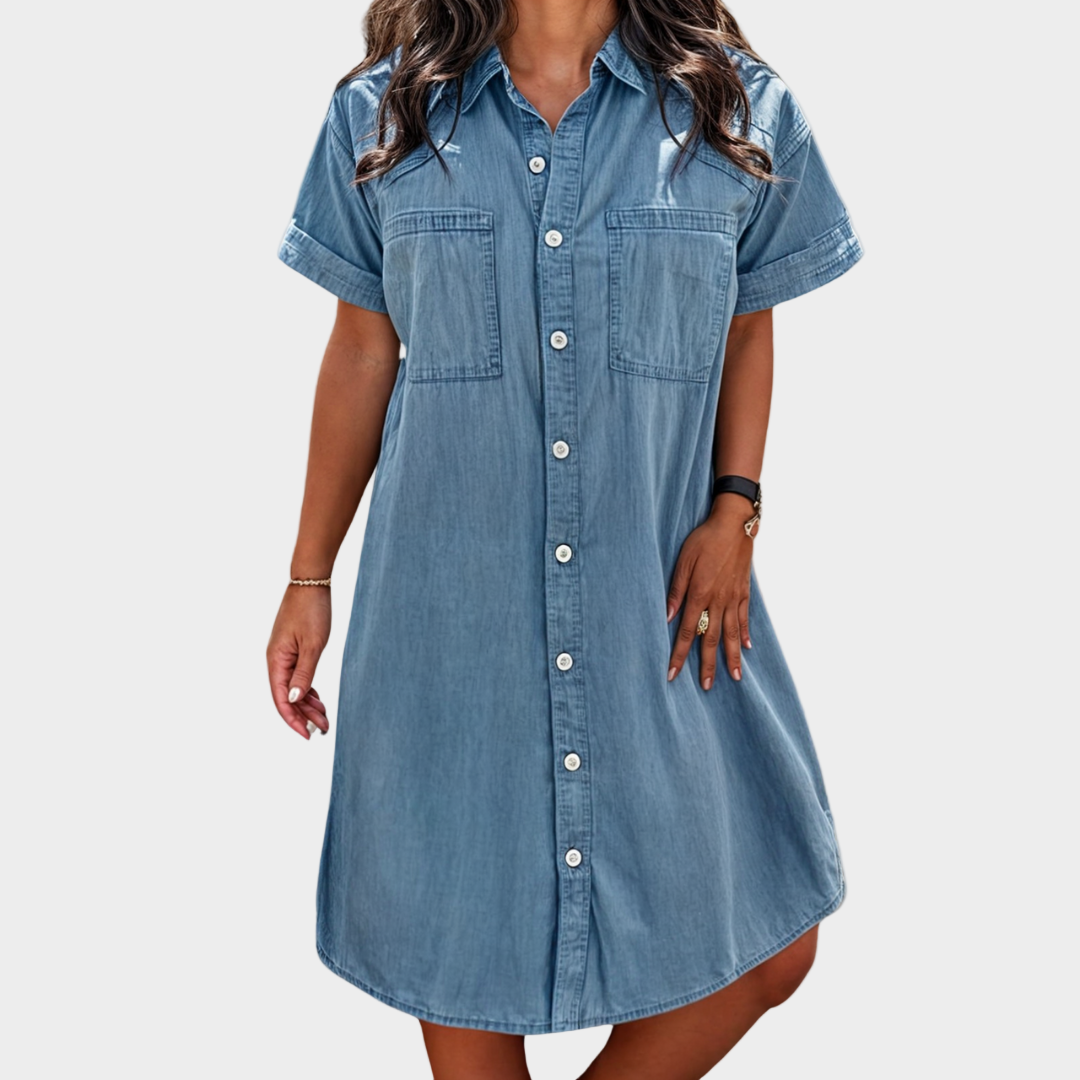 Woman wearing a lightweight denim button-through shirt dress