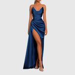 Woman wearing a satin maxi dress with thigh-high slit