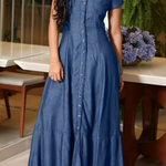 Woman wearing a long shirt-style denim dress