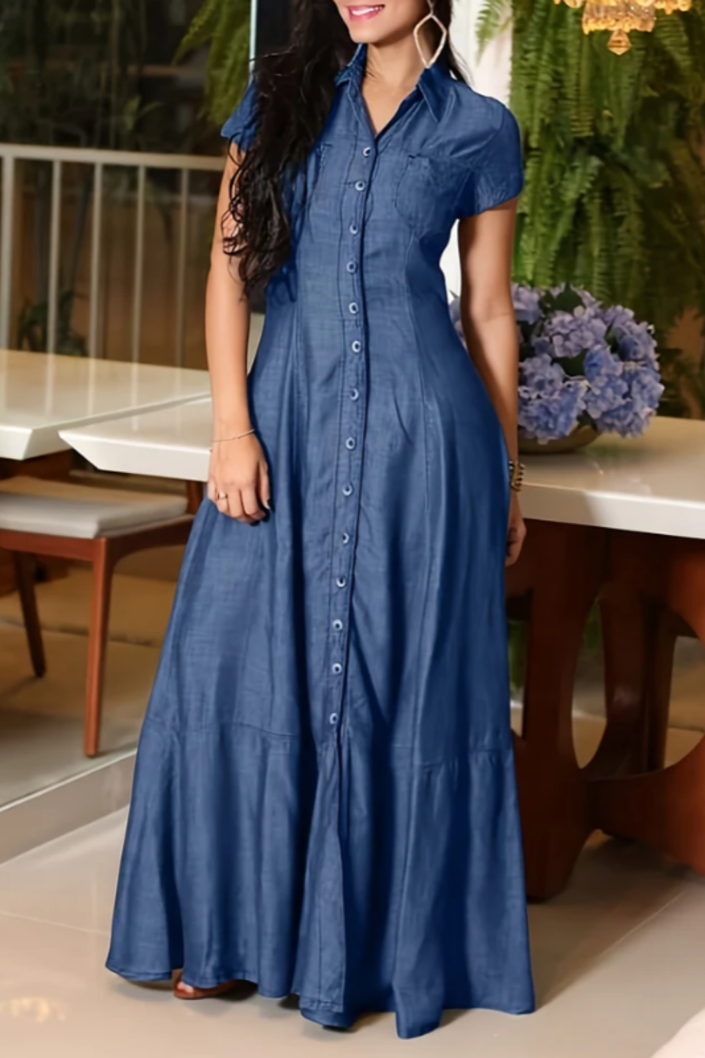 Woman wearing a long shirt-style denim dress