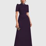 Woman wearing an elegant bridesmaid and evening gown