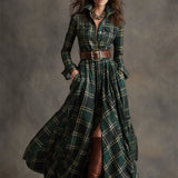 Woman wearing a belted plaid shirt dress with structured collar and flared skirt