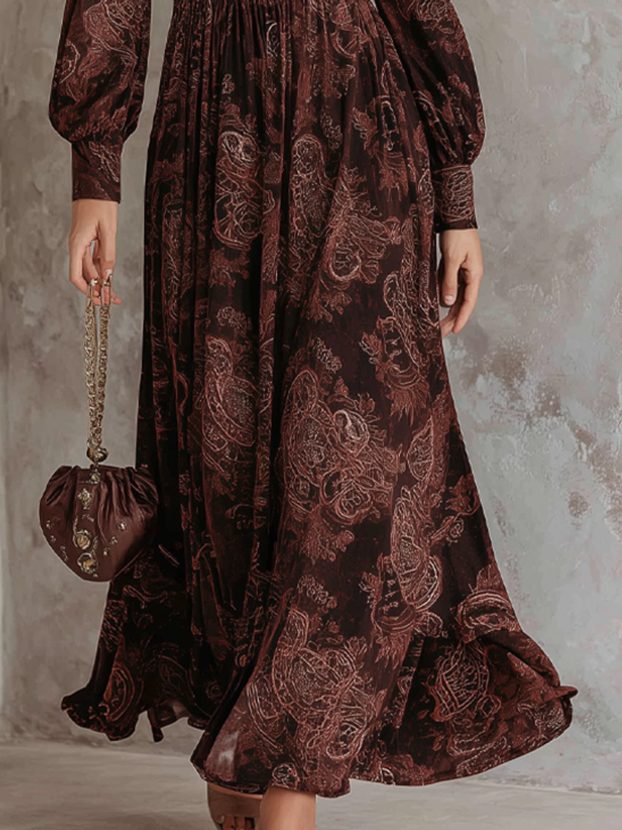 Woman wearing a paisley print zip-waist maxi dress
