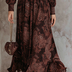 Woman wearing a paisley print zip-waist maxi dress