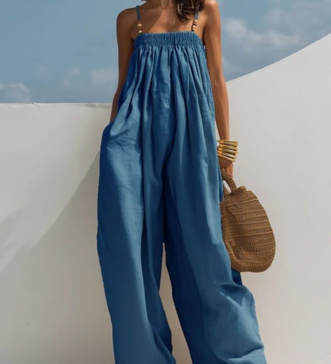 Woman wearing a wide-leg denim jumpsuit