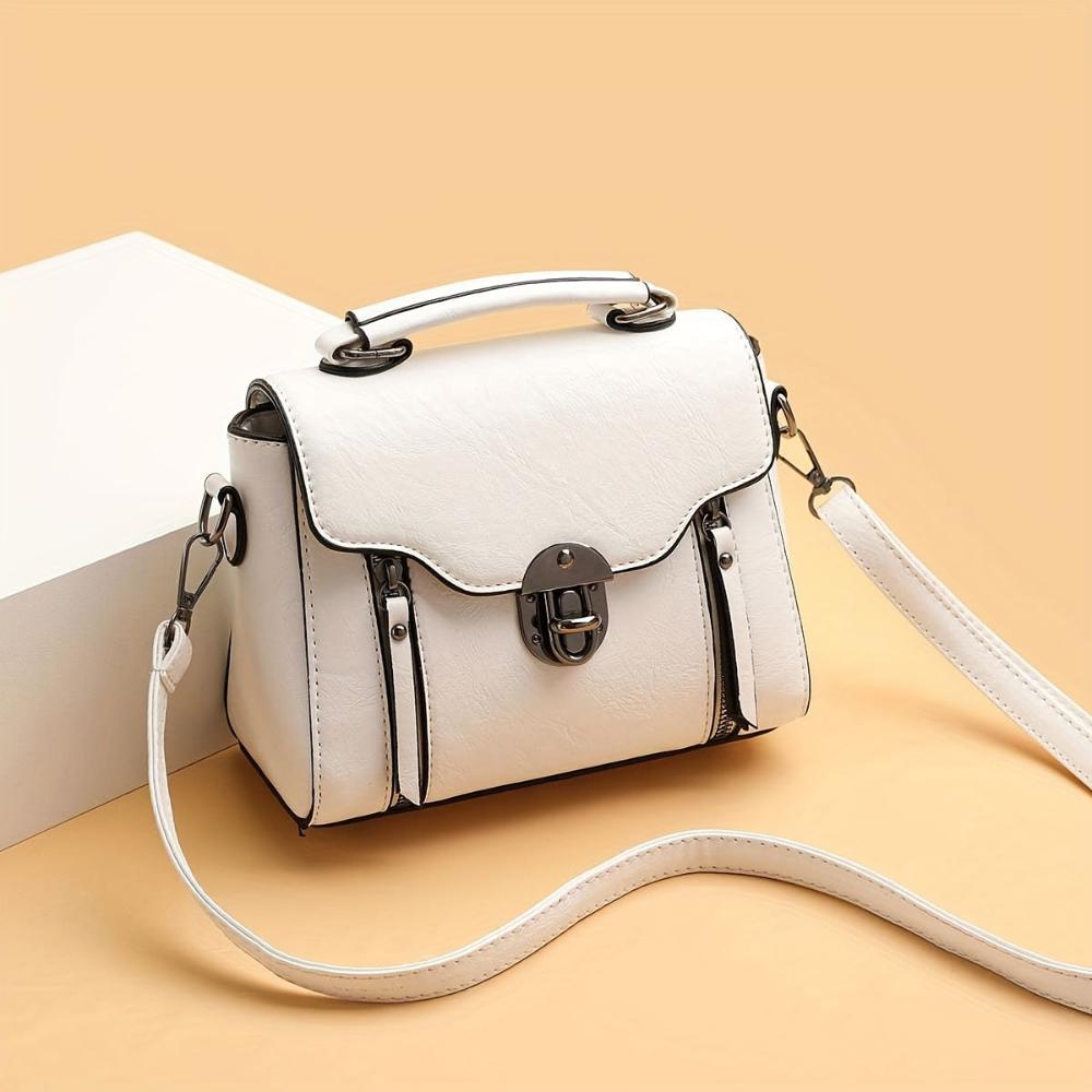 Twist-Lock Shoulder Bag by Eleanor Vale