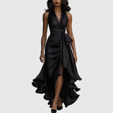 Woman wearing an evening wrap maxi dress with high slit