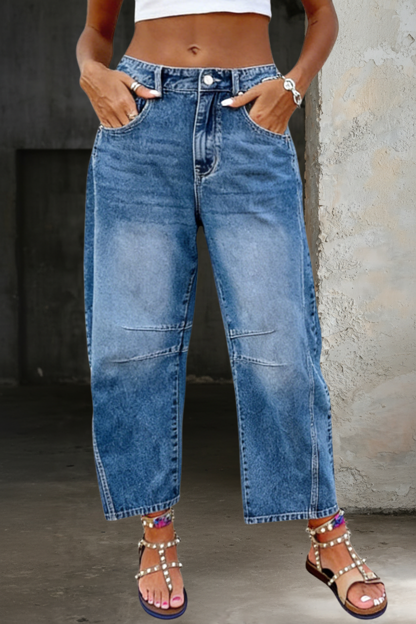 Woman wearing loose flare denim jeans with a flattering high-rise fit