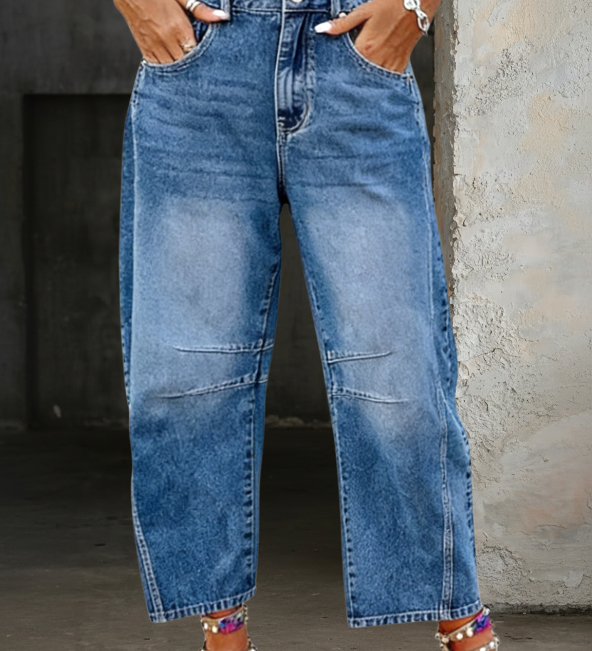 Woman wearing loose flare denim jeans with a flattering high-rise fit