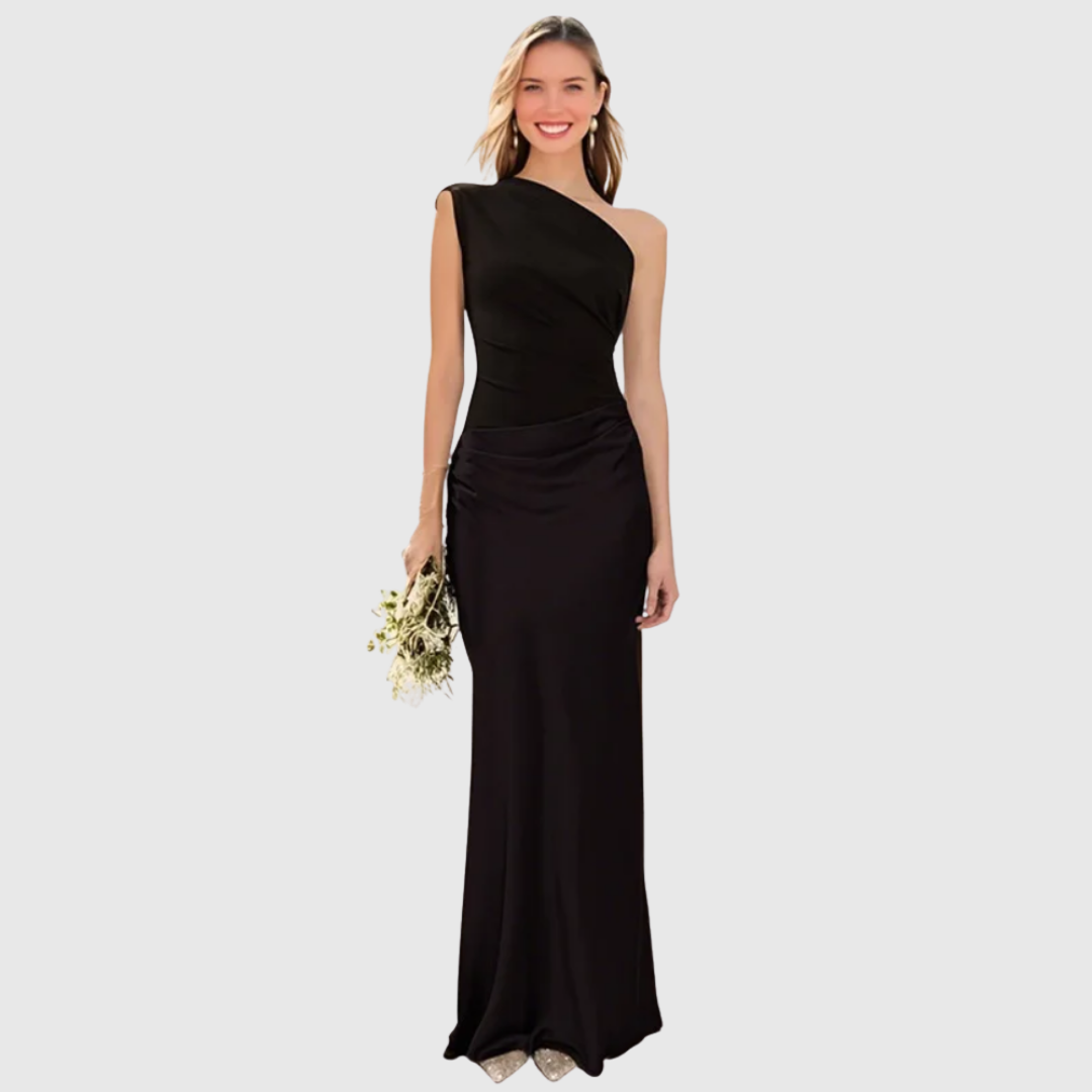 Woman wearing a one-shoulder satin maxi dress