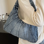 Woman carrying a casual shoulder bag