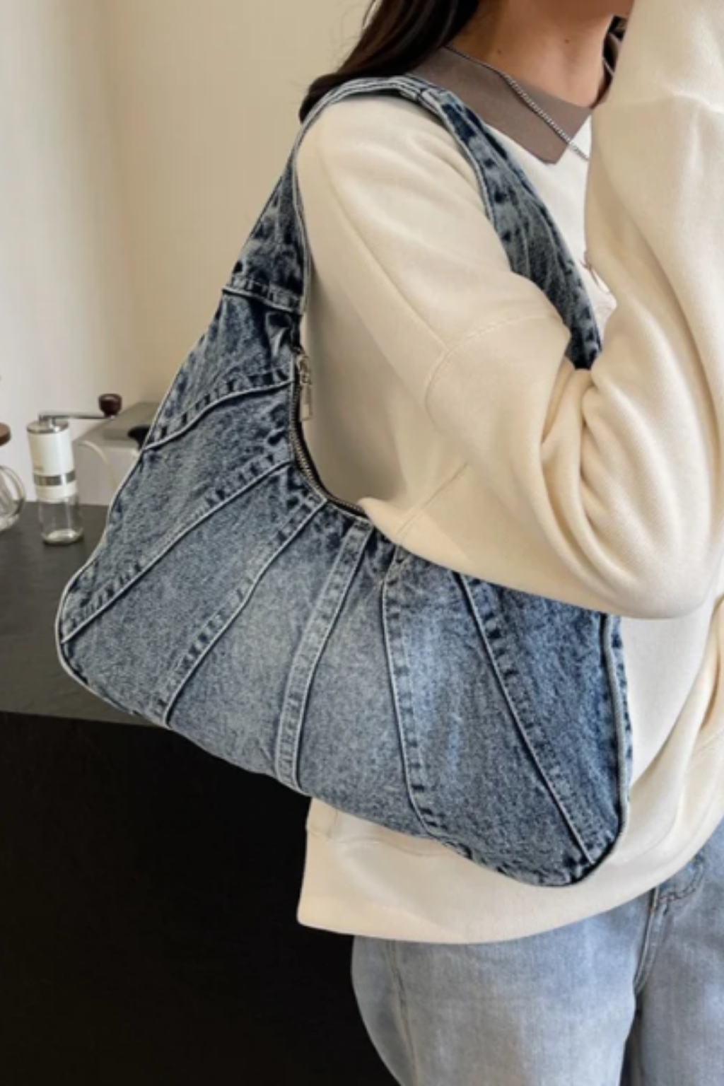 Woman carrying a casual shoulder bag
