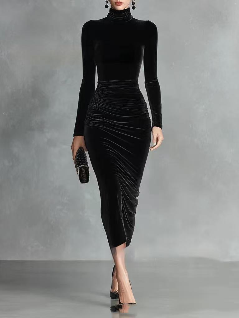 Woman wearing a black velvet fitted dress