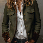 Woman wearing a herringbone blazer with contrast trim