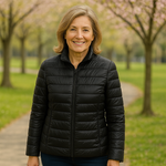 Woman wearing a black lightweight padded jacket
