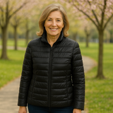 Woman wearing a black lightweight padded jacket