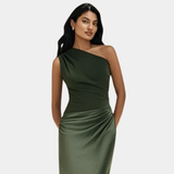 Woman wearing a one-shoulder satin maxi dress