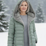 Woman wearing a fleece-lined quilted padded jacket with a shaped waist