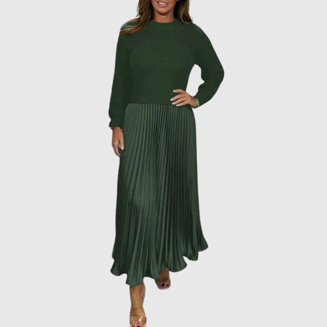 Woman wearing a maxi dress with a knit-look bodice and pleated skirt