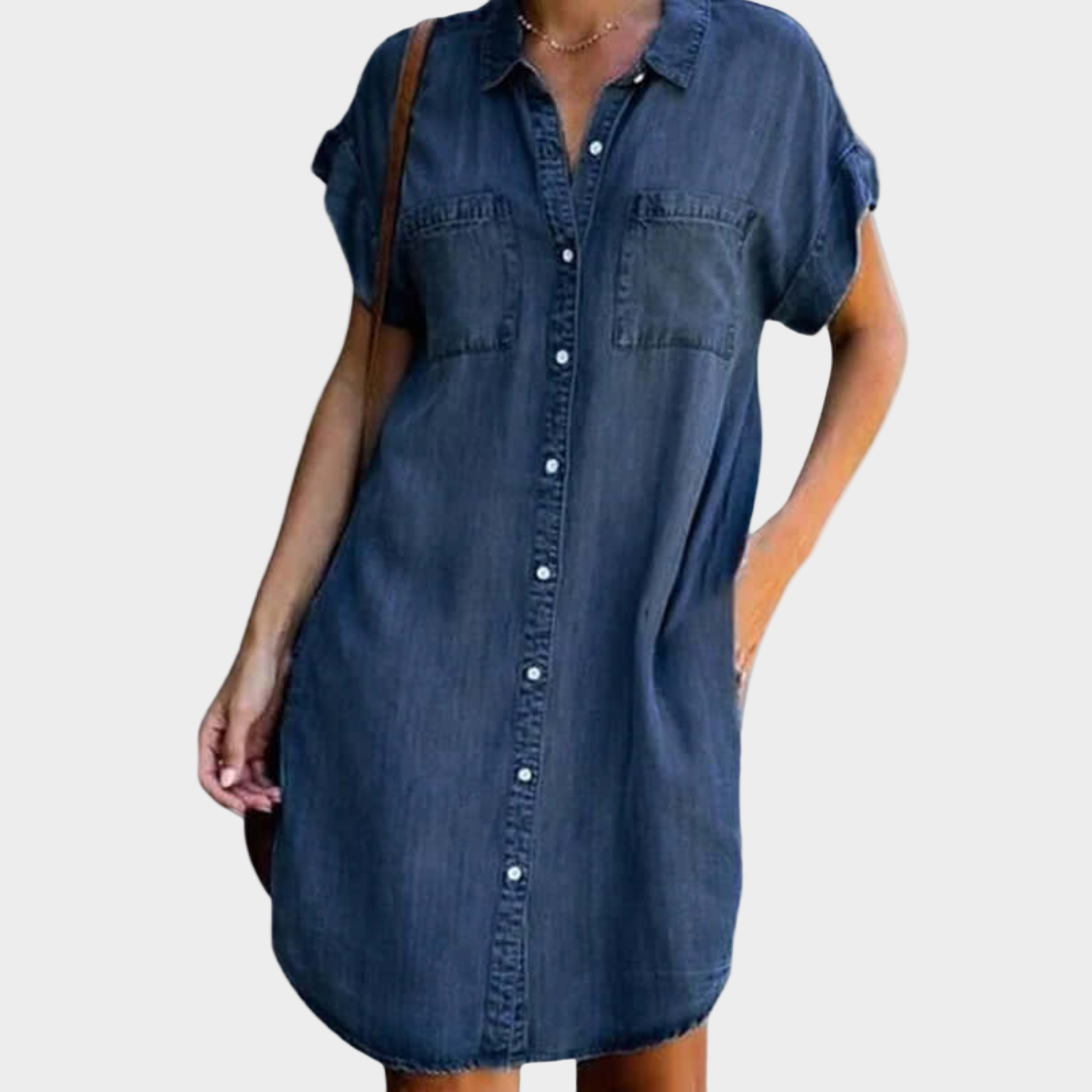 Woman wearing a loose-fit button-front denim dress