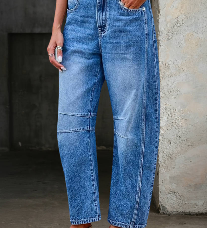 Woman wearing loose flare denim jeans with a flattering high-rise fit