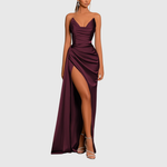 Woman wearing a satin maxi dress with thigh-high slit