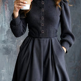 Woman wearing a vintage-inspired winter dress with pockets