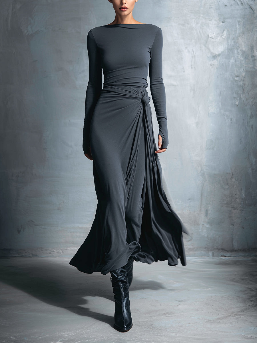 Woman wearing a long-sleeve maxi dress with an adjustable side tie