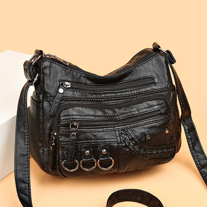 Multi-Zip Shoulder Bag by Eleanor Vale