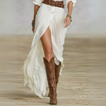 Woman wearing a button-front boho maxi dress with belt