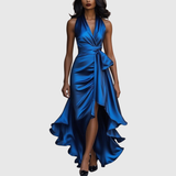 Woman wearing an evening wrap maxi dress with high slit