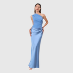 Woman wearing a one-shoulder satin maxi dress