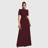 Woman wearing an elegant bridesmaid and evening gown