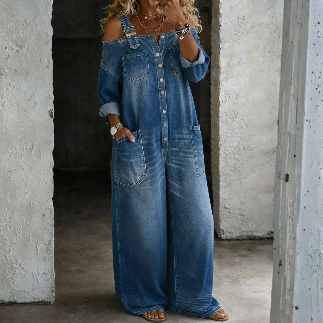 Woman wearing an off-shoulder denim jumpsuit