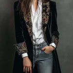 Woman wearing a long slim baroque print blazer