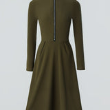Woman wearing a zip-front long-sleeve stretch dress