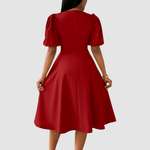 Puffed-Shoulder Midi Dress by Eleanor Vale