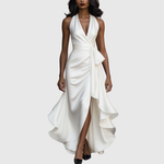 Woman wearing an evening wrap maxi dress with high slit