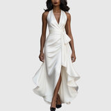 Woman wearing an evening wrap maxi dress with high slit