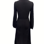 Woman wearing a vintage-inspired winter dress with pockets