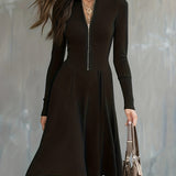 Woman wearing a zip-front long-sleeve stretch dress